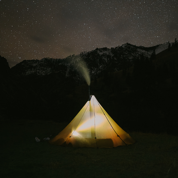 8 person tipi night time 